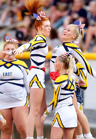 east cheer chest bump after TD